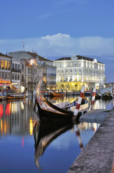 Framed Print : Aveiro at twilight and the traditional boat Moliceiro. Portugal Framed Print : Aveiro at twilight and the traditional boat Moliceiro. Portugal