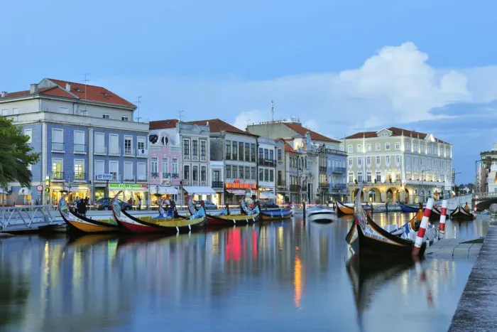 Framed Print : Aveiro at twilight and the traditional boat Moliceiro. Portugal Framed Print : Aveiro at twilight and the traditional boat Moliceiro. Portugal