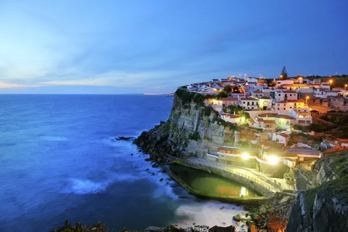 Framed Print : Azenhas do Mar at night, near Sintra, in front of the Atlantic Ocean. Portugal