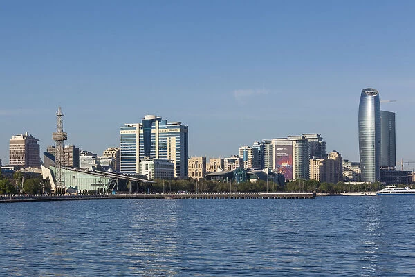 Azerbaijan, Baku, Bulvar Promenade, city skyine from Baku Bay