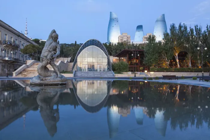 Framed Print : Azerbaijan, Baku, Flame Towers and entrance to Funicular railway reflecting in Bharam Framed Print : Azerbaijan, Baku, Flame Towers and entrance to Funicular railway reflecting in Bharam
