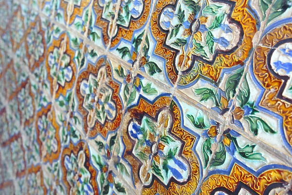 Azulejo ornament on the wall, Alcazar, royal palace, Seville, Andalusia, Spain