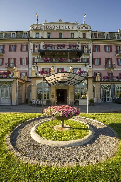 Bagni Nuovi, Bormio, Valtellina, Lombardy, Italy. Luxury Grand Hotel at sunset