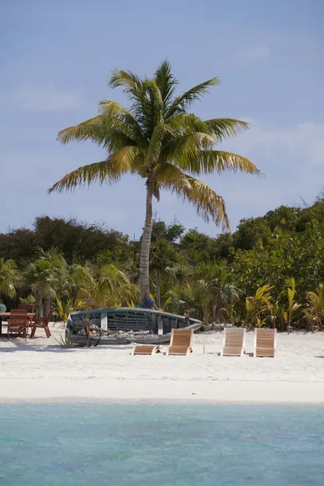 Framed Print : Bahamas. Beach chairs on the sand on an island