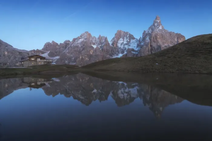 Framed Print : The Baita Segantini and the Pale di San Martino perfectly reflecting into a small lake at twilight. Dolomites, italy Framed Print : The Baita Segantini and the Pale di San Martino perfectly reflecting into a small lake at twilight. Dolomites, italy