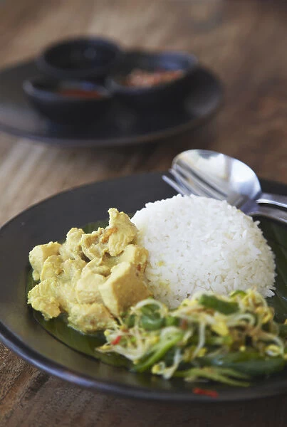 Balinese dish of Be Siap Basa Mekalas (chicken in cardamon sauce), Bali, Indonesia