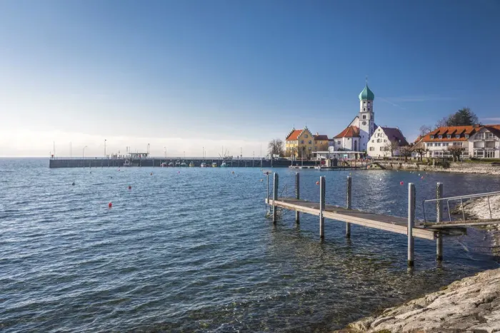 Framed Print : Bank promenade with St. Georg Church, Wasserburg am Bodensee, Bavaria, Germany