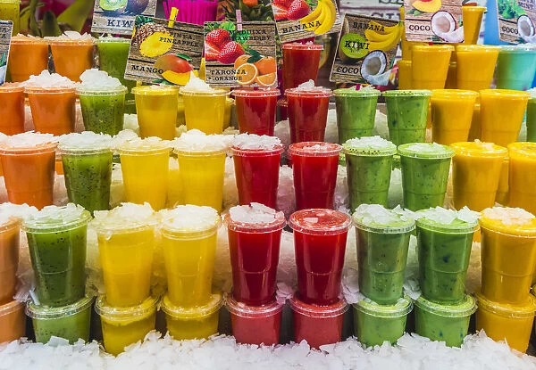Barcelona, Catalonia, Spain, Southern Europe. Fresh colored juices at the Boqueria Market