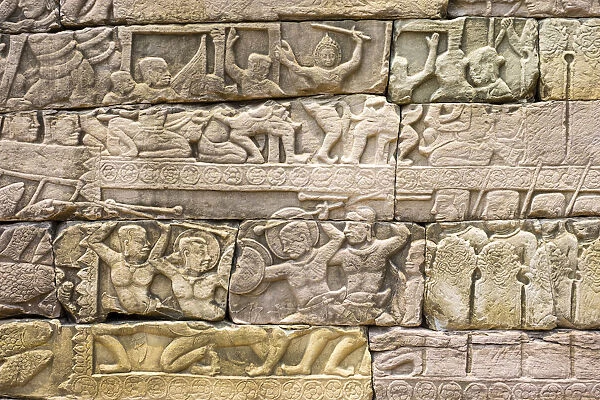 Bas-relief stone carvings depicting battle, Banteay Chhmar, Ankorian-era temple ruins