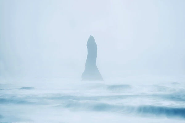 Basalt column of Vik during a sea storm, Sudurland, Iceland
