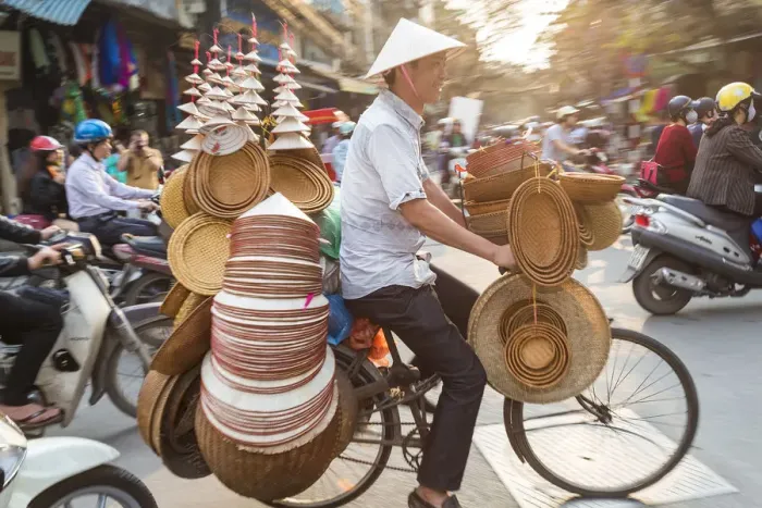 Framed Print : Basket & hat seller on bicycle, Hanoi, Vietnam Framed Print : Basket & hat seller on bicycle, Hanoi, Vietnam
