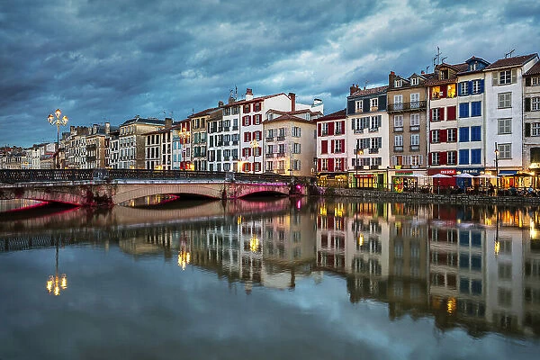 Basque houses reflected in the Nive, Bayonne, Pyrenees-Atlantiques, Nouvelle Aquitaine, France