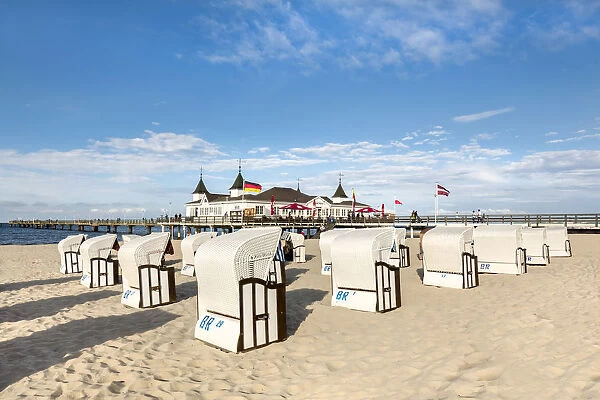 Beach baskets in front of pier, Ahlbeck, Usedom island, Mecklenburg-Western Pomerania