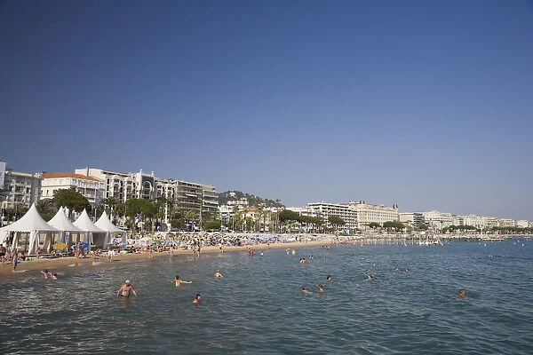 Beach and Boulevard de la Croisette with Carlton Hotel, Cannes, Cote D Azur, France