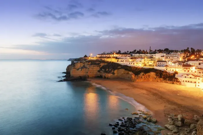 Framed Print : The beach of Carvoeiro at dusk. Algarve, Portugal Framed Print : The beach of Carvoeiro at dusk. Algarve, Portugal