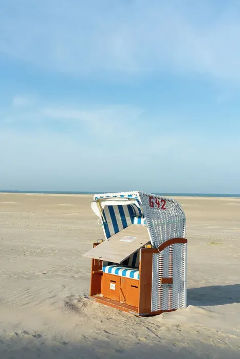 Framed Print : Beach chair on beach against sky, Norddorf, UNESCO, Amrum island, Nordfriesland, Schleswig-Holstein, Germany