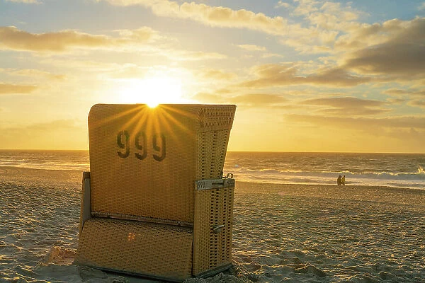 Beach chair at sunset, Wenningstedt beach, Sylt, Nordfriesland, Schleswig-Holstein, Germany