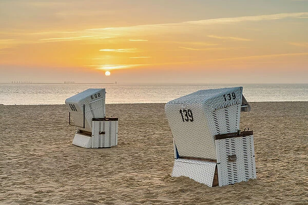 Beach chairs at Hornum beach at sunrise, Sylt, Nordfriesland, Schleswig-Holstein, Germany