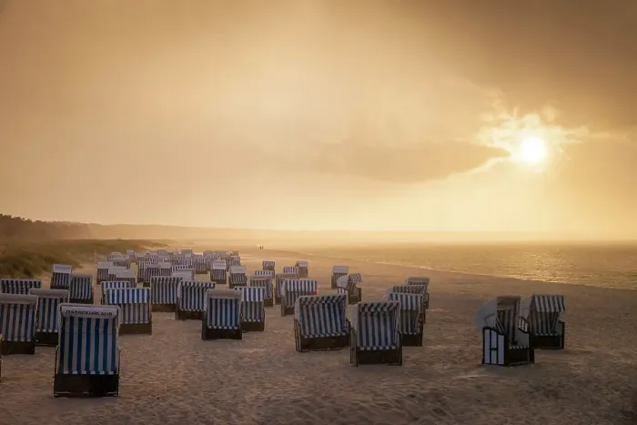 Framed Print : Beach chairs with rain clouds with sunset in Prerow, Mecklenburg-Western Pomerania, Baltic Sea, North Germany, Germany