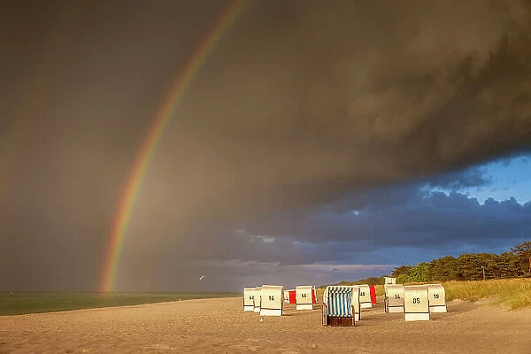 Beach chairs with rainbow after the storm on Prerow Beach, Mecklenburg-Western Pomerania, Baltic Sea, North Germany, Germany