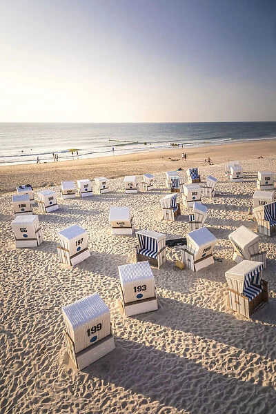 Beach chairs on the Red cliff in Kampen at sunset, Sylt, Schleswig-Holstein, Germany