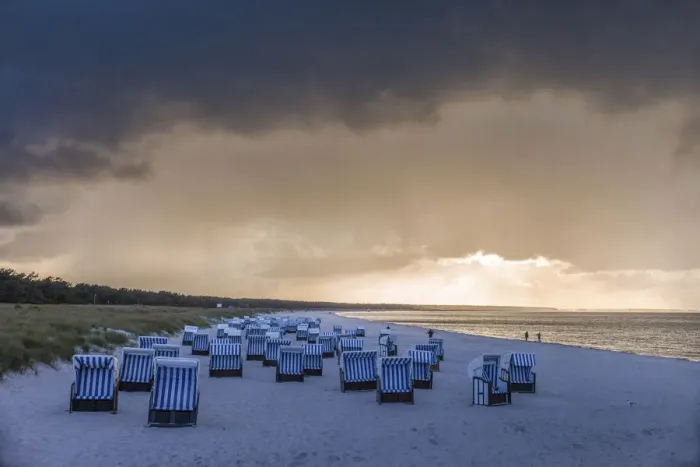 Framed Print : Beach chairs with storm clouds in Prerow, Mecklenburg-Western Pomerania, Northern Germany Framed Print : Beach chairs with storm clouds in Prerow, Mecklenburg-Western Pomerania, Northern Germany