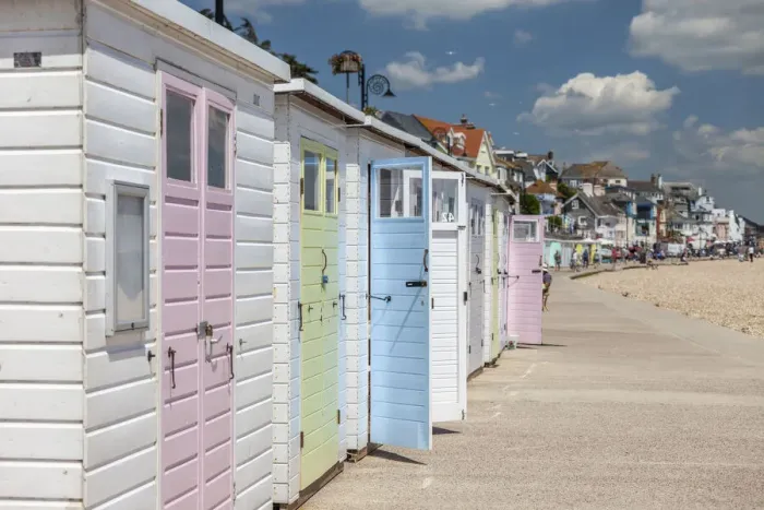 Framed Print : Beach huts in the seaside resort of Lyme Regis, Dorset, England Framed Print : Beach huts in the seaside resort of Lyme Regis, Dorset, England