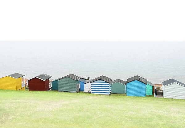 Beach huts on Tankerton beach, near Whitstable, Kent, England