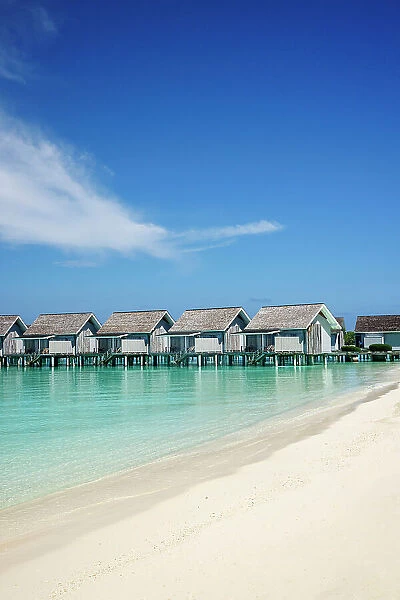 Beach huts on a tropical island in the Indian Ocean, North Ari Atoll, the Maldives