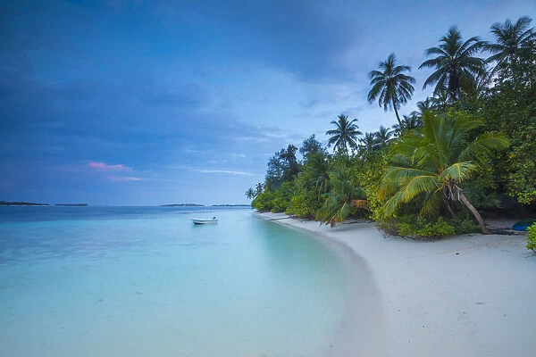 Beach on a tropical island in the South Male Atoll, Maldives