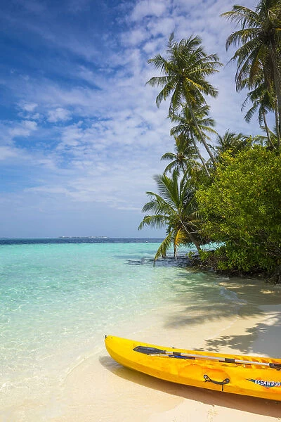 Beach on a tropical island in the South Male Atoll, Maldives