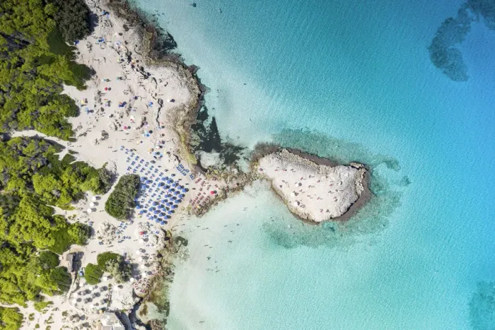 Framed Print : Beach umbrellas on white sand beach by turquoise sea from above, Punta della Suina Framed Print : Beach umbrellas on white sand beach by turquoise sea from above, Punta della Suina