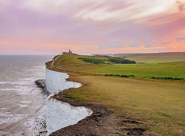 Beachy Head Cliffs and Belle Tout Lighthouse at sunset, Eastbourne, East Sussex, England, United Kingdom