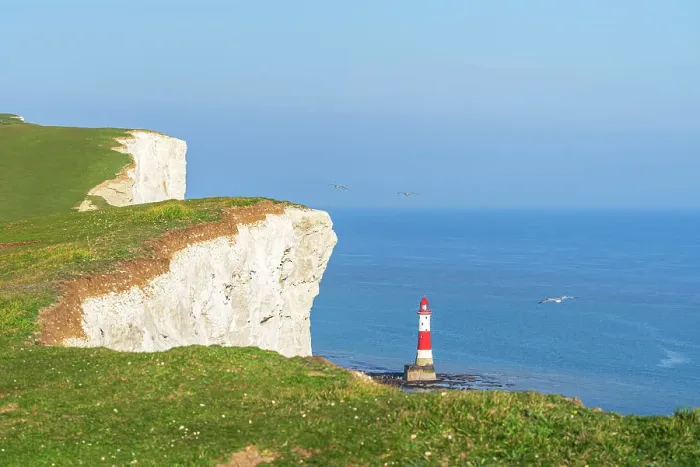 Framed Print : Beachy Head lighthouse and chalk white cliffs, aerial view, Seven Sisters Country Park, East Sussex, England, United Kingdom Framed Print : Beachy Head lighthouse and chalk white cliffs, aerial view, Seven Sisters Country Park, East Sussex, England, United Kingdom