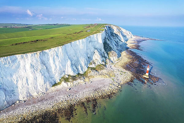 Beachy Head lighthouse and chalk white cliffs, aerial view, Seven Sisters Country Park, East Sussex, England, United Kingdom