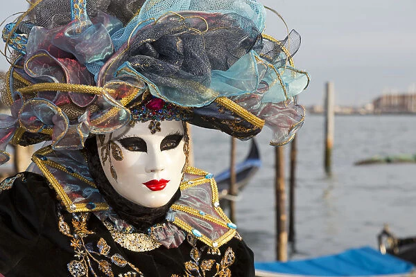 Beautiful costume and mask at the Venice Carnival, Piazza San Marco (St