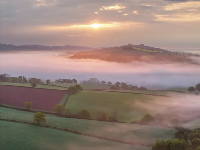 Framed Print : Beautiful rolling countryside on a misty morning, Mid Devon, England. Spring (April) 2025 Framed Print : Beautiful rolling countryside on a misty morning, Mid Devon, England. Spring (April) 2025