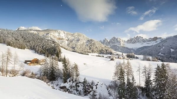 a beautiful winter landscape of Villnoss with the Geisler in the background, Bolzano province