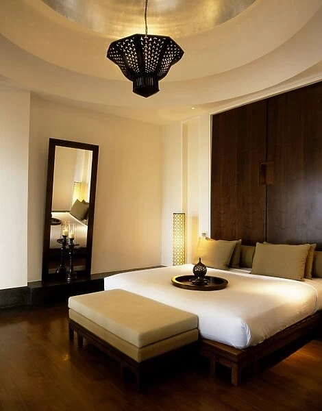 The bedroom of a suite in the Chedi Hotel