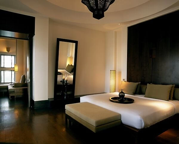 The bedroom of a suite in the Chedi Hotel