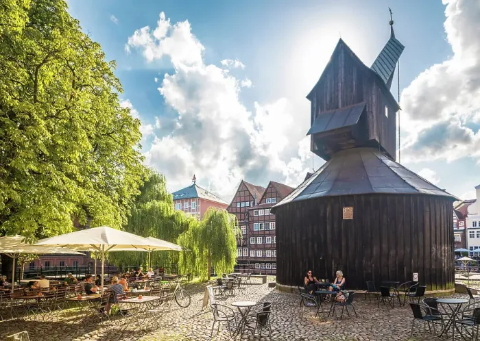Framed Print : Beer garden and old crane at the fish market, Luneburg, Lower Saxony, Germany