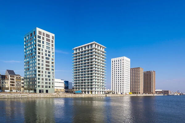 Belgium, Flanders, Antwerp (Antwerpen). Modern residential block towers along the