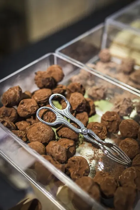 Framed Print : Belgium, Flanders, Ghent, Chocolate truffles in a stand of the Christmas market in Framed Print : Belgium, Flanders, Ghent, Chocolate truffles in a stand of the Christmas market in