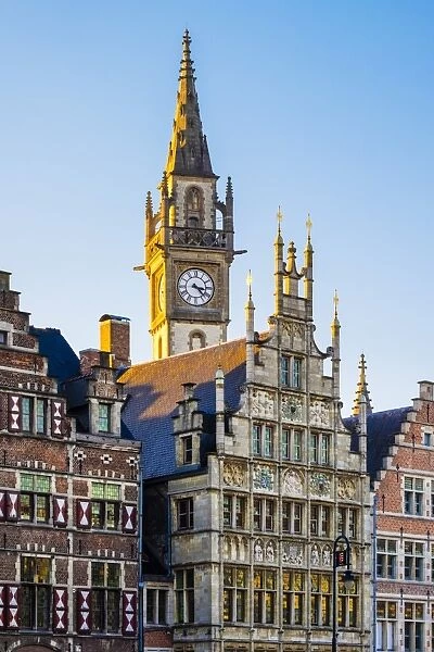 Belgium, Flanders, Ghent (Gent). Old Post Office clocktower and medieval guild houses