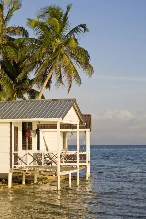 Framed Print : Belize, Tobaco Caye, Hotel over- water cabanas