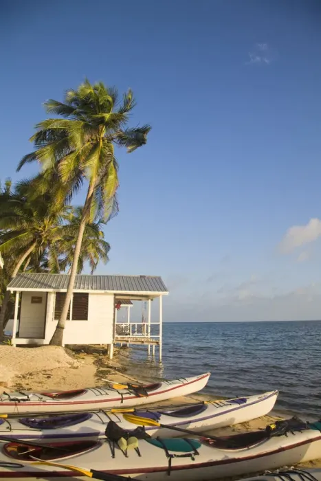 Framed Print : Belize, Tobaco Caye, Kayaks on beach by hotel cabanas Framed Print : Belize, Tobaco Caye, Kayaks on beach by hotel cabanas