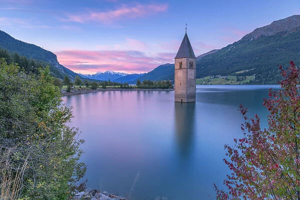 Bell tower submerged of Resia lake at sunrise Europe, Italy, Trentino Alto Adige