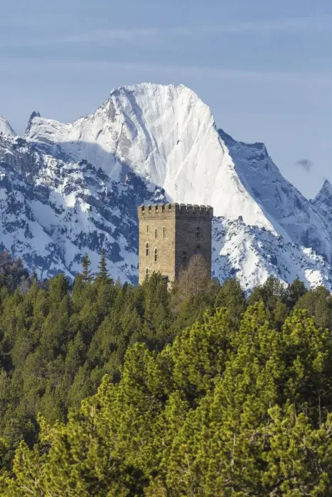 Framed Print : The Belvedere Tower frames the snowy peaks and Peak Badile on a spring day Maloja Framed Print : The Belvedere Tower frames the snowy peaks and Peak Badile on a spring day Maloja