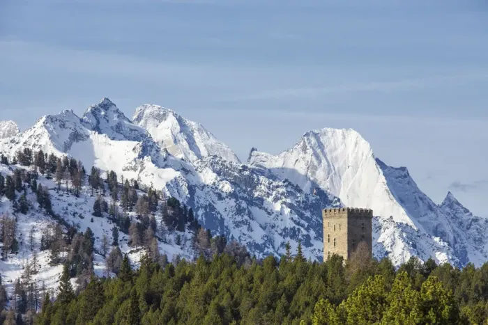 Framed Print : The Belvedere Tower frames the snowy peaks and Peak Badile on a spring day Maloja Framed Print : The Belvedere Tower frames the snowy peaks and Peak Badile on a spring day Maloja