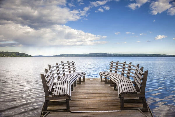 Benches on the banks of Lake Maalaren in Sigtuna, Stockholm County, Sweden